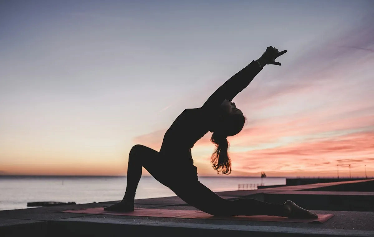 Person stretching on a yoga mat